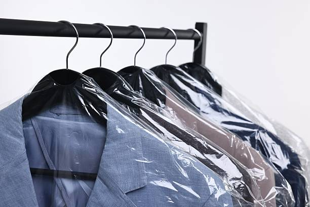 Freshly cleaned garments wrapped and ready for pickup at Coastal Cleaners